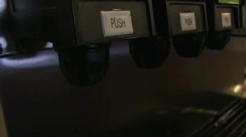 Filling cup with soda at machine Stockbeeldmateriaal 10607975