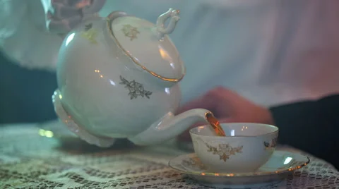 Filling up the cup with tea Stock Footage 49426561