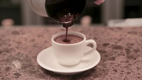 Filling the cup with Turkish coffee Stock Footage 145199554