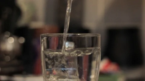 Filling Up a Cup With Water Stock Footage 85994696
