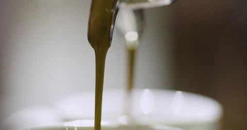 Filling up cups with coffee from machine Stock Footage 152446971