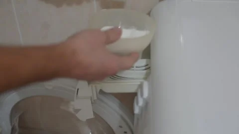 Filling detergent in washer Stock Footage 220548703