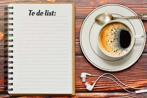 Filling up to do list during a coffee break Stock Photos