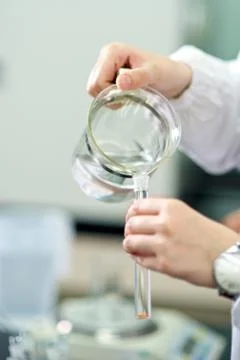 Filling empty test tubes Stock Photos