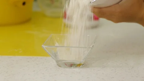 Filling flour into a vessel Stock Footage 115522949