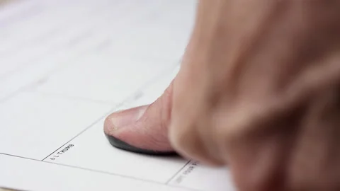 Filling form macro fingerprint registration finger print form paperwork Stock Footage 158865644