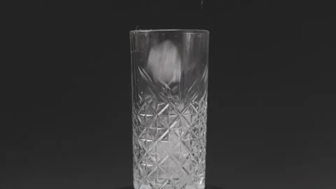 Filling Glas with Ice, Black Background, Clog3, Cinema Gamut Stock Footage 241814963