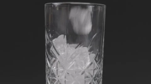 Filling Glas with Ice, Black Background, Clog3, Cinema Gamut Stock Footage 241814983