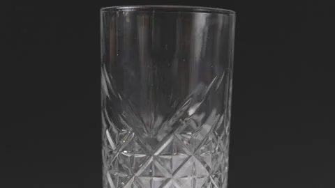 Filling Glas with Ice, Black Background, Clog3, Cinema Gamut Stock Footage 241815036