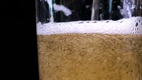 Filling up a glass of beer Video stock 196213258