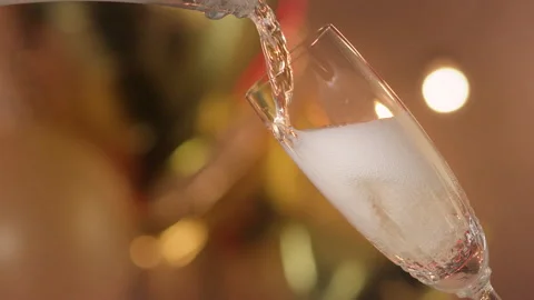 Filling a glass of champagne in slow-motion Stock Footage 135241753