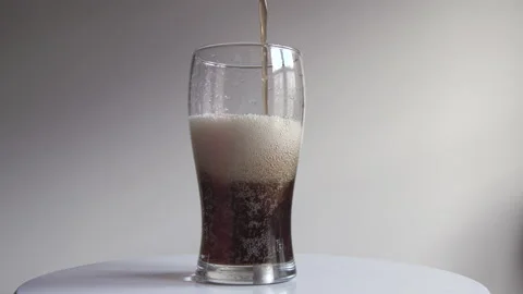 Filling a glass with cola Stock Footage 138897961
