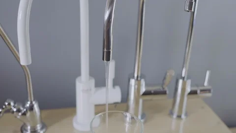 Filling glass drinking water from filter tap. Water tasting. Healthy lifestyle 스톡 동영상 126997924