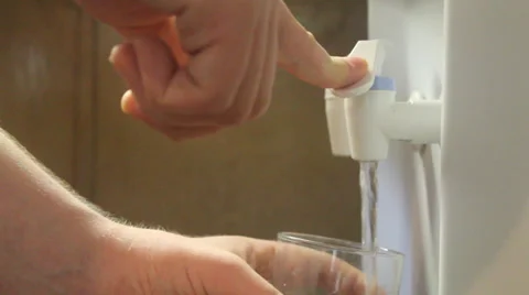 Filling up a glass of water Stock Footage 28401659