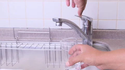 Filling A Glass WIth Water Stock Footage 95961713