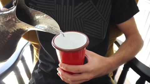 Filling the glass with water. Stock Footage 257501067