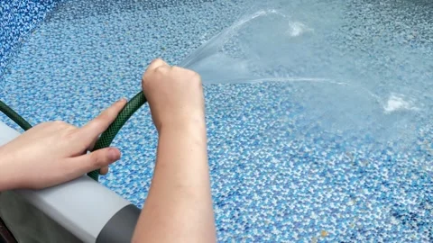 Filling Inflatable Garden Pool with Tap Water Video stock 278038759
