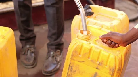 Filling an JerryCan with kerosene Stock Footage 58114346