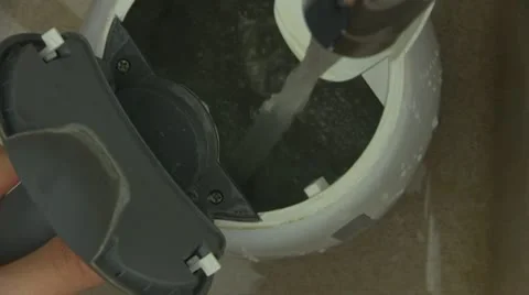 Filling a kettle with water Video stock 21224486