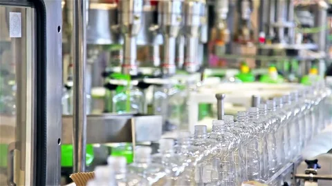 Filling line of liquid detergent in the plastic bottles Stock Footage 70155429