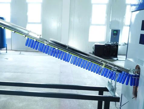 Filling line in plastic flasks. Liquid Filling Stock Photos