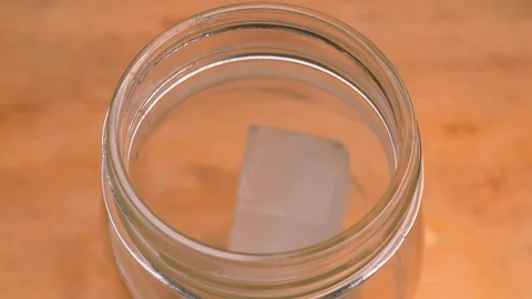 Filling a mason jar with ice Stock Footage 91505872