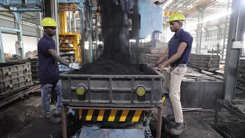 Filling mold with sand in C.I. Casting Foundry. Stock Footage 252571497