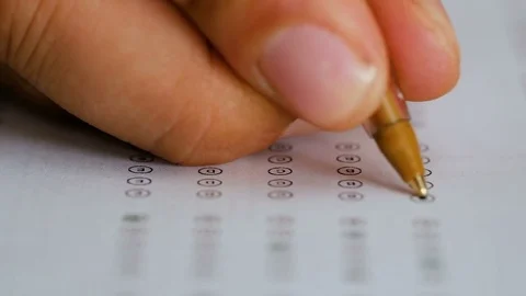 Filling in  a multiple-choice test Stock Footage 78079811