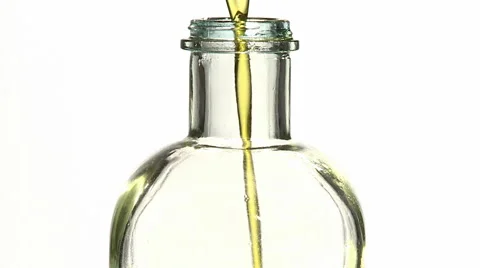 FILLING OIL BOTTLE Stock Footage 981820