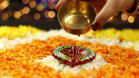 Filling Or Pouring Oil In Decorative Clay Diya Deep Or Dia Stock Footage 163425853