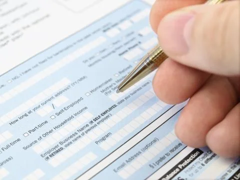 Filling out  Application Form Stock Photos