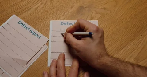 Filling Out Defect Report – Quality Control Documentation Stock Footage 330857074
