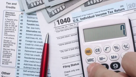 Filling out tax forms. High angle view. Stock Footage 82931609
