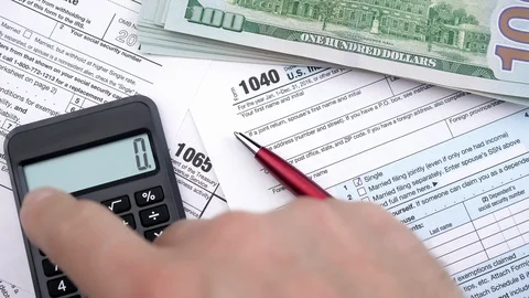 Filling out tax forms. Time lapse. High angle view. Stock Footage 120183859