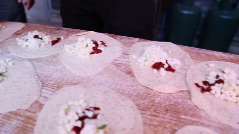 Filling Panzerotti with Fresh Mozzarella Stockbeeldmateriaal 79055416