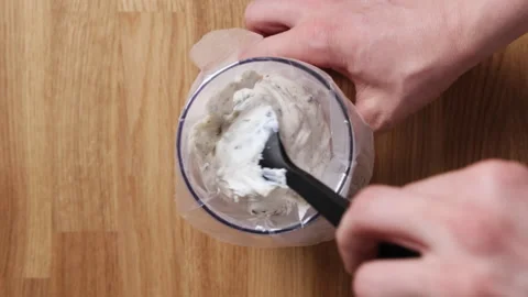 Filling Piping Bag With Ricotta Using Spatula Top View 스톡 동영상 334240782