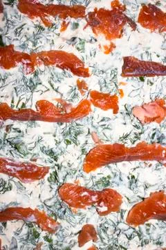 Filling for pita bread with red fish.Background of red fish pieces. Stock Photos