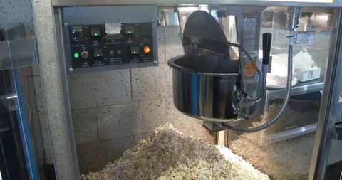 Filling Popcorn Machine - Theater Stock Footage 125527322