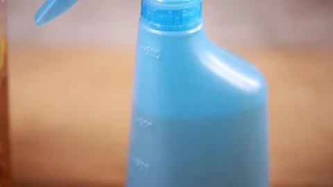 Filling self-made enzyme cleaner (3) Stock Footage 202234599