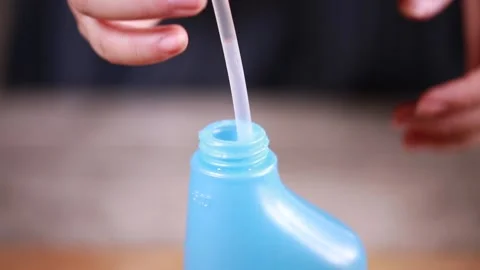 Filling self-made enzyme cleaner (2) Stock Footage 202234603