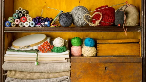 Filling shelves by materials and tools for handmade, embroidery and knitting Stock Footage 85727983