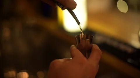 Filling shot of brandy in a club Stock Footage
