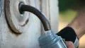 Filling small flask at park HD Footage
