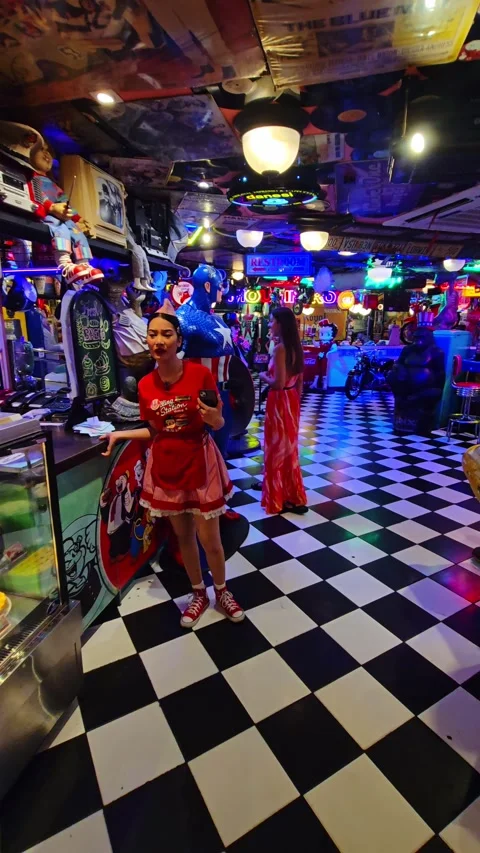Filling Station 24 Bar Cafe Makati Philippines neon retro diner interior Stock Footage 333869287