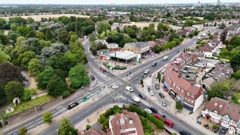 Filling Station and Shops at a West London Crossroads Stock Footage 343469804