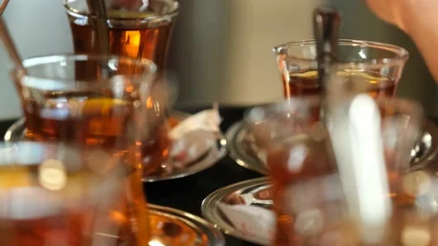 Filling Too Many Cups of Tea from a Teapot 動画素材 203057656