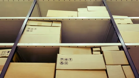 Filling the warehouse with boxes with goods.  Stock Footage 152112164