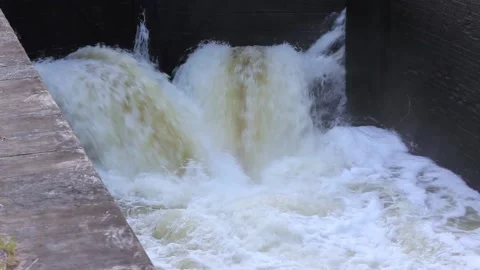 Filling water in an artificial canal through a sluice.Belarus Stock Footage 161627612