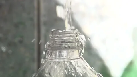 Filling water bottle at source Stock Footage 160301550