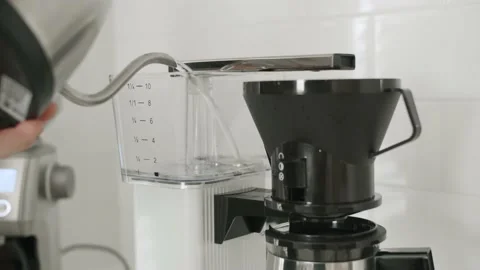 Filling water tank of a Coffee maker machine. Stock Footage 140284063